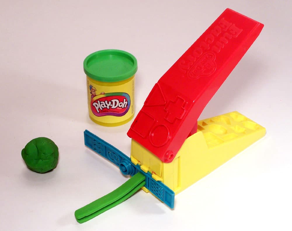 Brightly coloured play dough for sensory play.