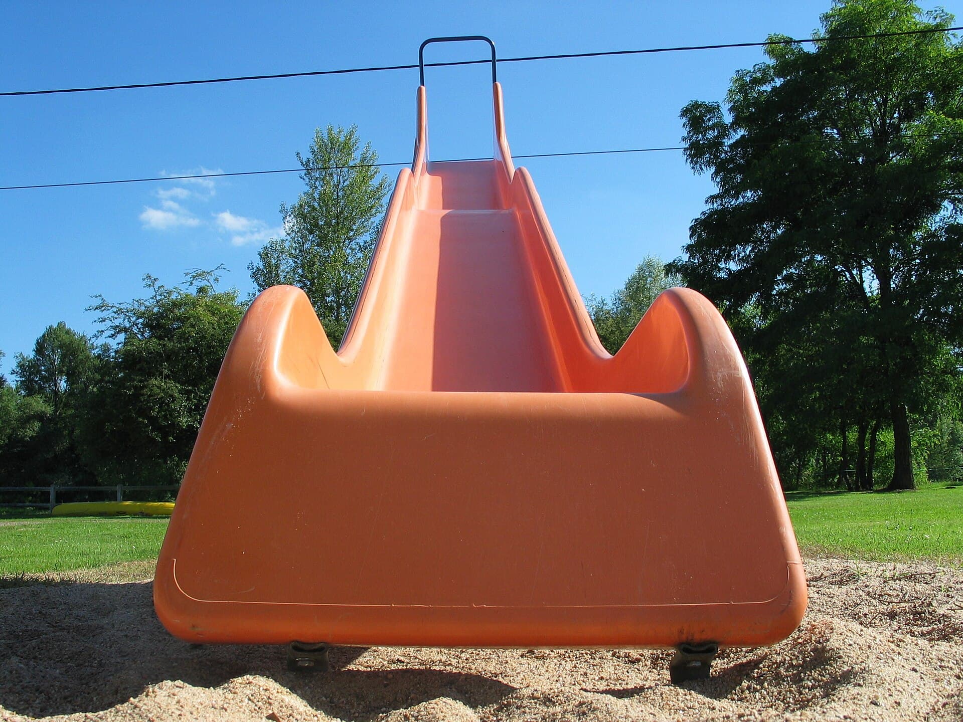 A close-up of a colourful play slide.